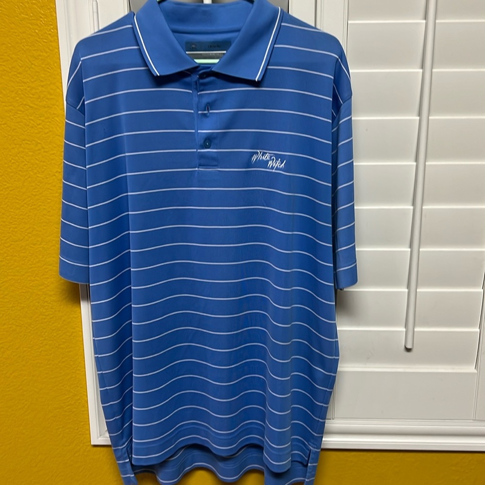 Cutter & Buck men’s XL golf shirt. Back is 1-1/2” longer than the front hem.